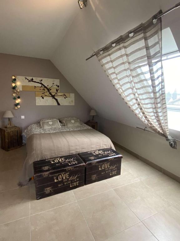 Postel nebo postele na pokoji v ubytování B&B Chez Séverine