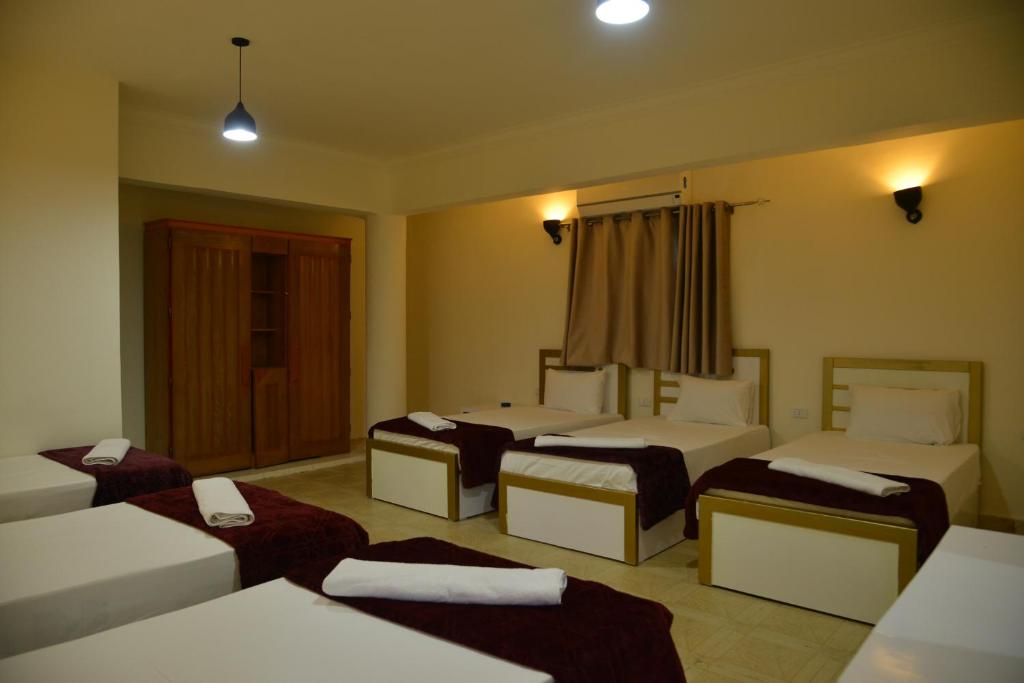 Postel nebo postele na pokoji v ubytování Brother Hotel Dahab