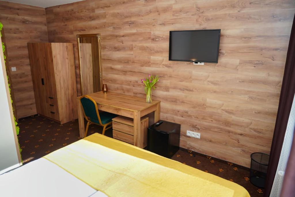 TV a/nebo společenská místnost v ubytování Hotel Raj
