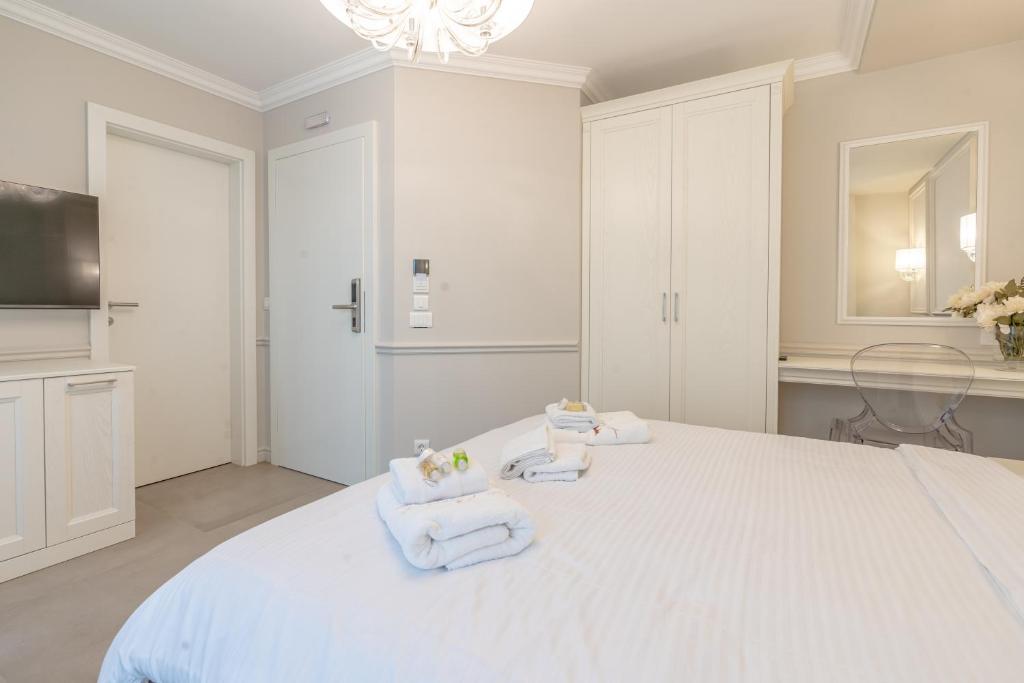 Postel nebo postele na pokoji v ubytování Villa & Spa Chunarot