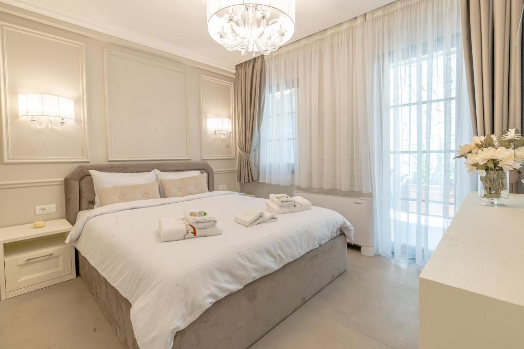 Postel nebo postele na pokoji v ubytování Villa & Spa Chunarot