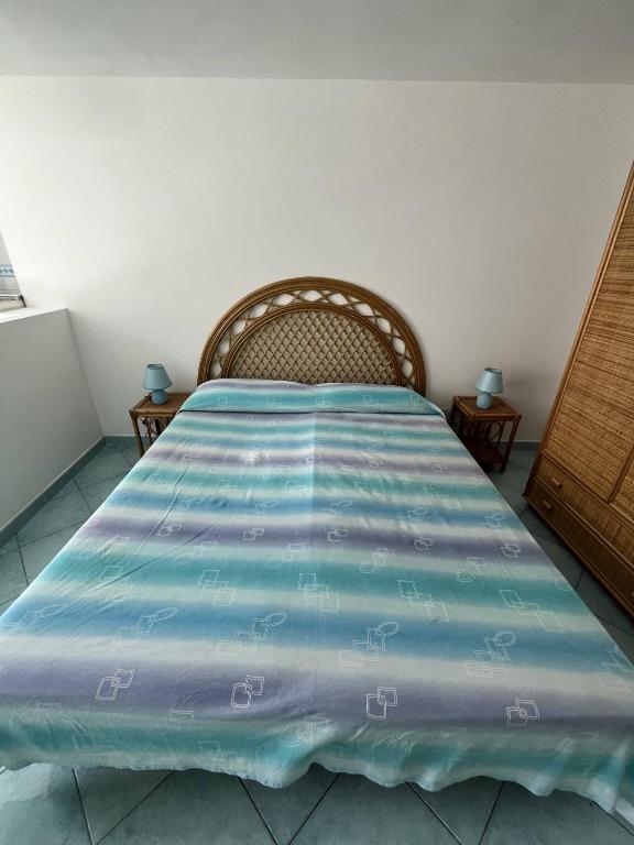 Postel nebo postele na pokoji v ubytování Il Mirto