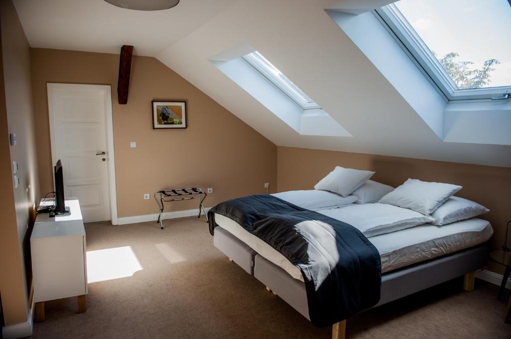 Postel nebo postele na pokoji v ubytování Braun Rooms Deluxe