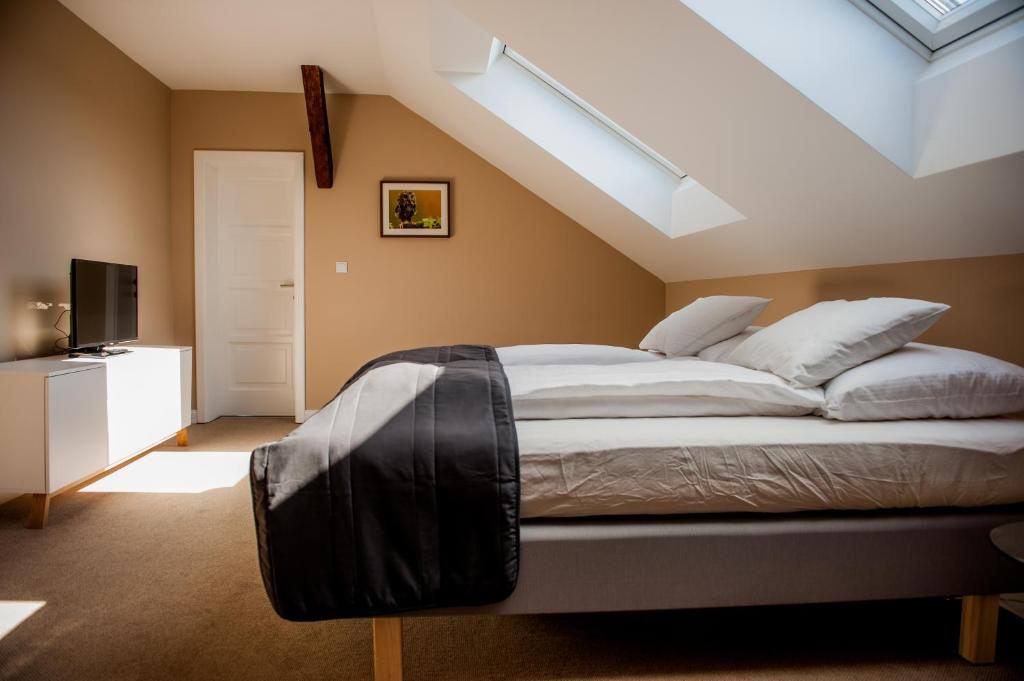 Postel nebo postele na pokoji v ubytování Braun Rooms Deluxe