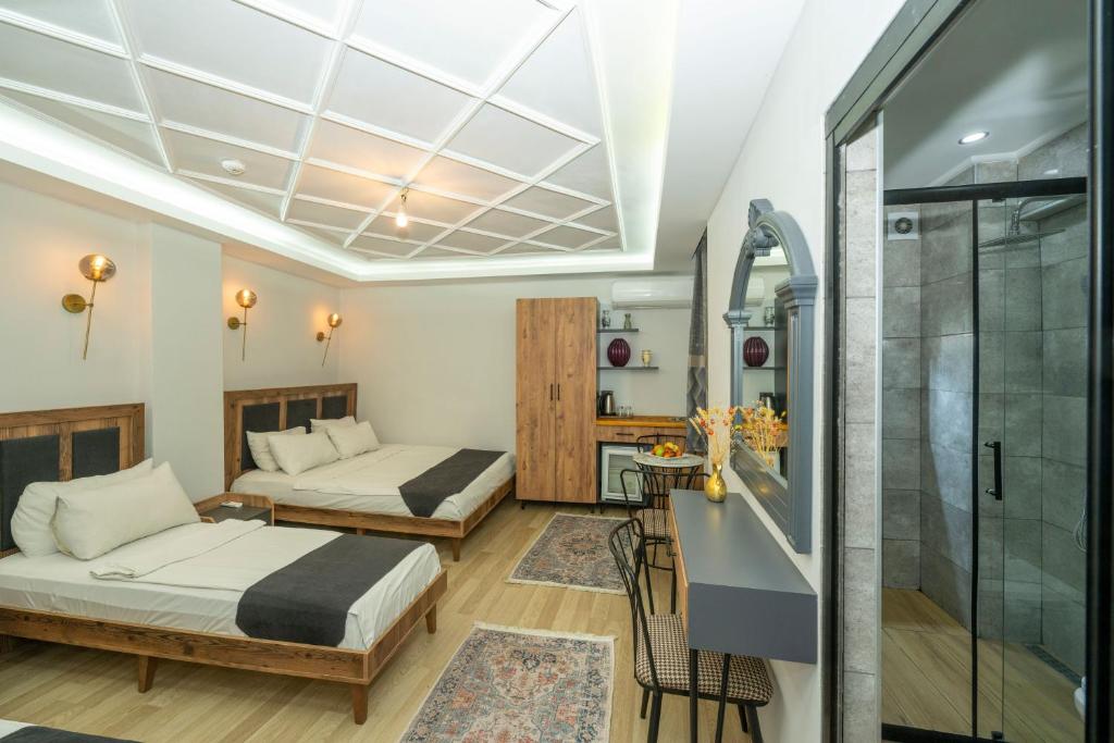 Postel nebo postele na pokoji v ubytování Valeria House