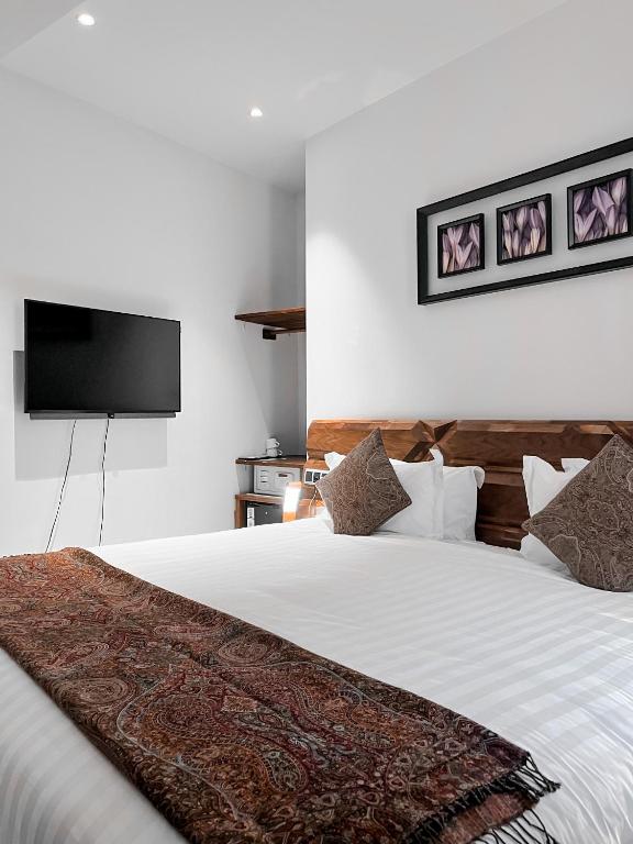 Posteľ alebo postele v izbe v ubytovaní Anahita Boutique Hotel