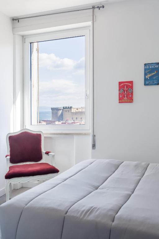 Łóżko lub łóżka w pokoju w obiekcie Napolidays Toledo Apartment By Dimorra