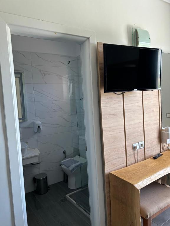 Koupelna v ubytování Perea Hotel