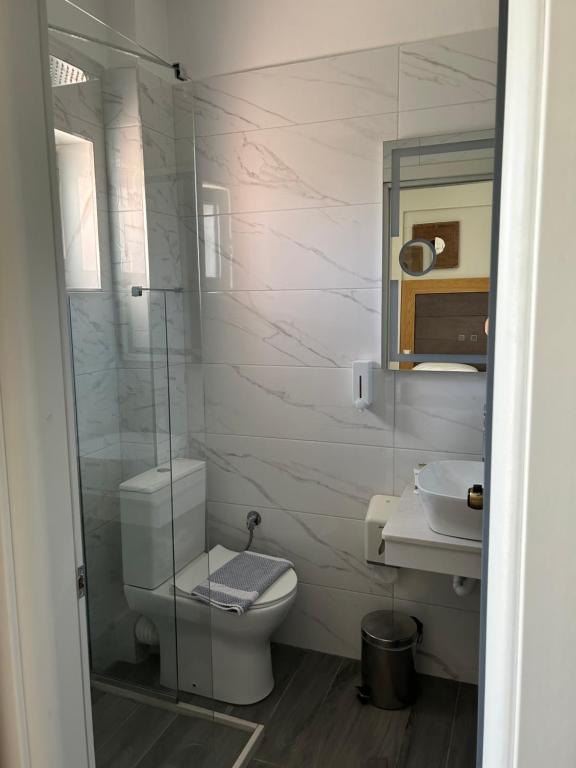 Koupelna v ubytování Perea Hotel