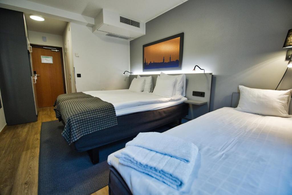 Letto o letti in una camera di Hotel Birger Jarl