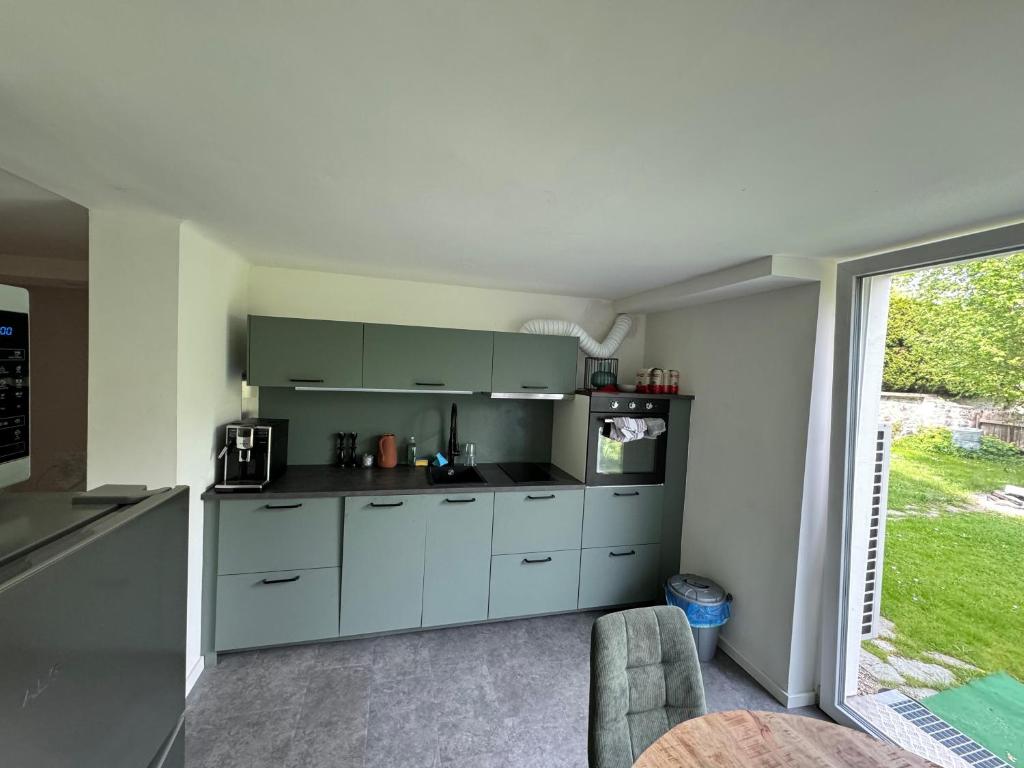 Kuchyň nebo kuchyňský kout v ubytování L&P Appartement Klagenfurt
