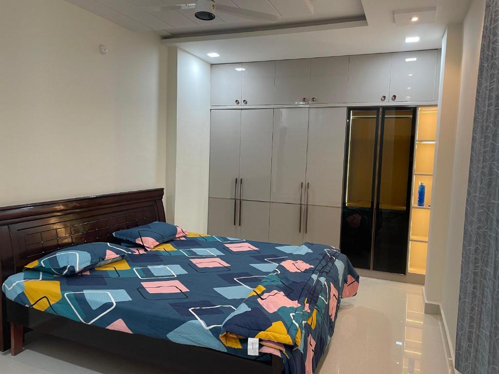 Voodi või voodid majutusasutuse Vinayaka Villas toas