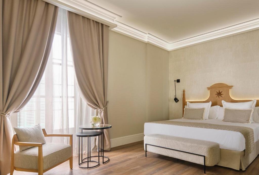 Postel nebo postele na pokoji v ubytování Hotel Antigua Palma - Casa Noble
