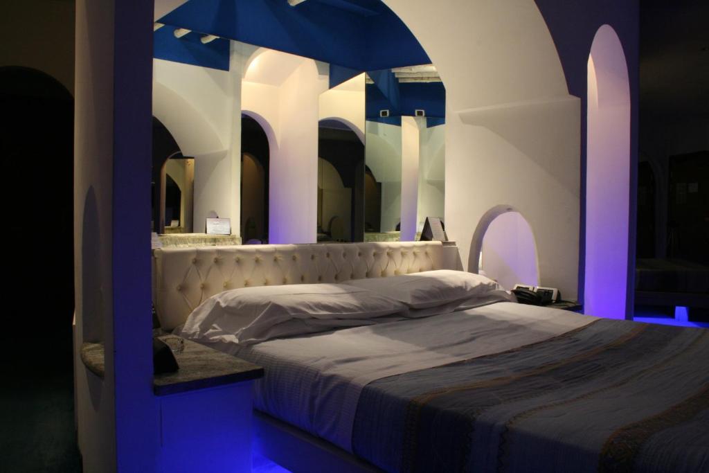 Postel nebo postele na pokoji v ubytování Hotel Motel K