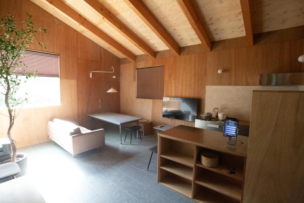 Kuchyň nebo kuchyňský kout v ubytování MAGATAMA.INN