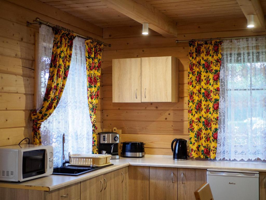 Kuchyň nebo kuchyňský kout v ubytování Domki i Pokoje obok Term Chochołów U Tadka