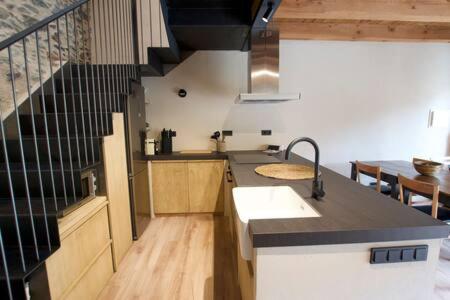 Kuchyň nebo kuchyňský kout v ubytování Cal Rus Apartament 3
