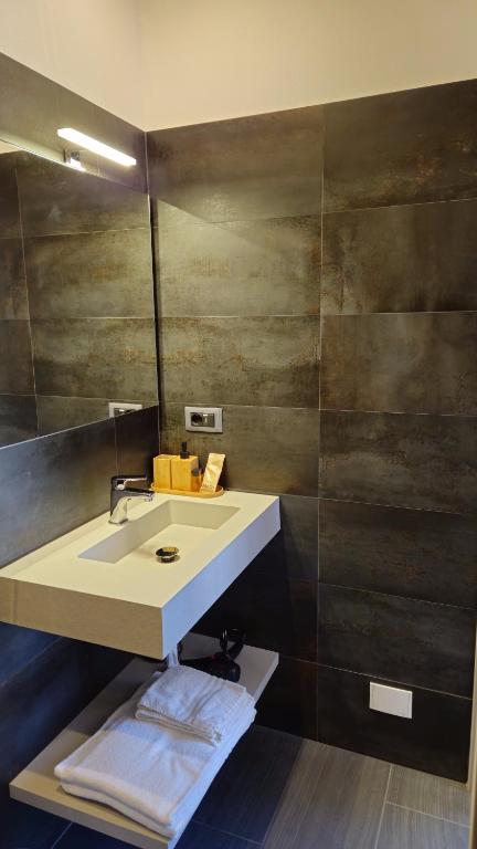 Koupelna v ubytování Real Rooms Dalia