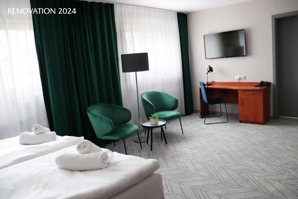 TV a/nebo společenská místnost v ubytování Hotel Polonia Centrum