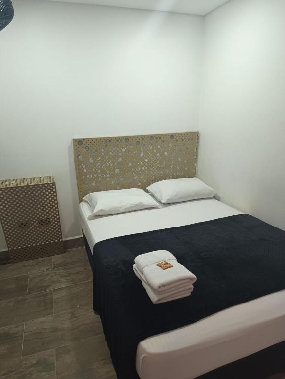 Postel nebo postele na pokoji v ubytování Hotel Prestige