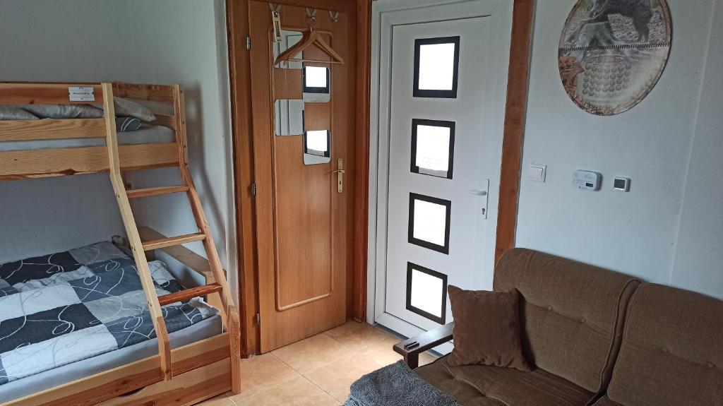 Postel nebo postele na pokoji v ubytování Chaloupka u Vejvodů