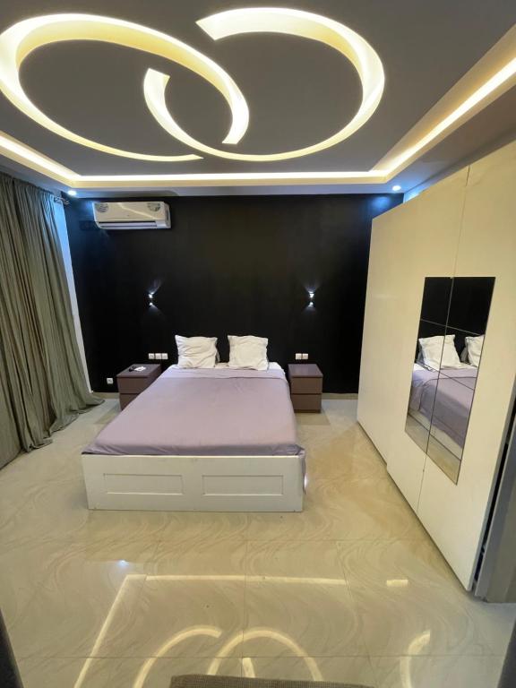 Postel nebo postele na pokoji v ubytování Appartement 2 chambres balcon ABA
