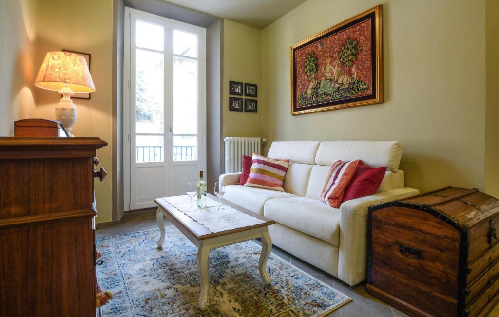 a living room with a couch and a table at Beautiful Apartment In Volterra in Volterra