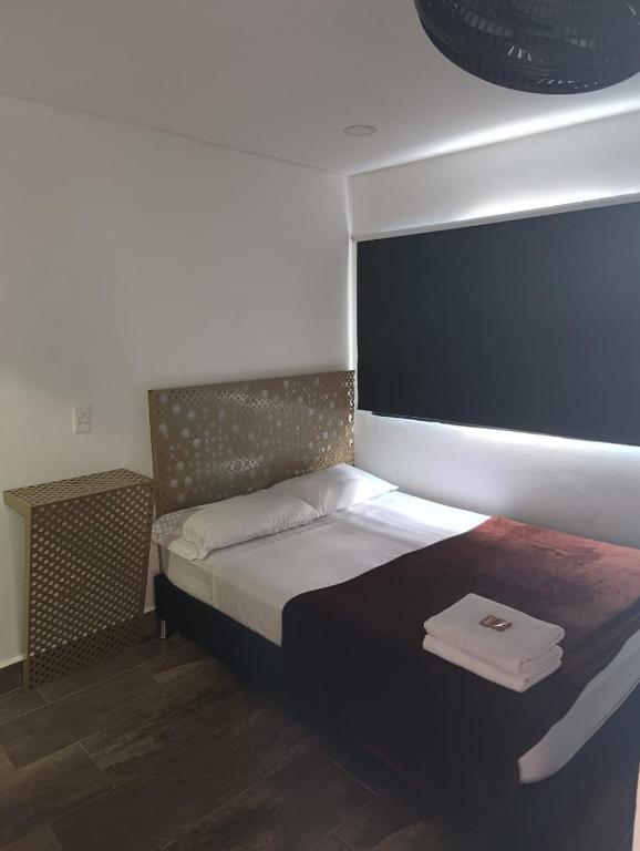 Postel nebo postele na pokoji v ubytování Hotel Prestige