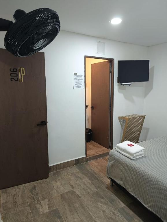 Postel nebo postele na pokoji v ubytování Hotel Prestige