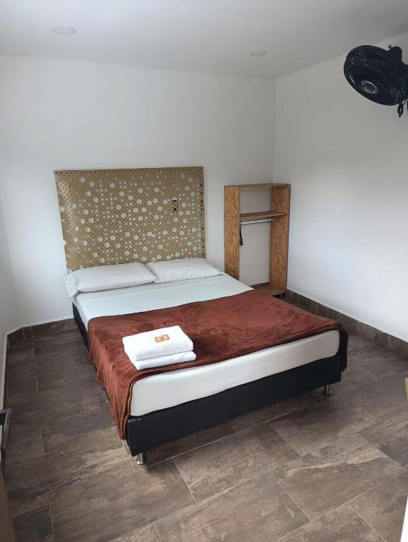 Postel nebo postele na pokoji v ubytování Hotel Prestige