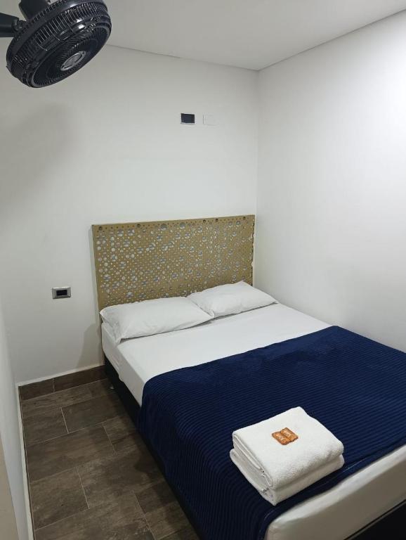 Postel nebo postele na pokoji v ubytování Hotel Prestige