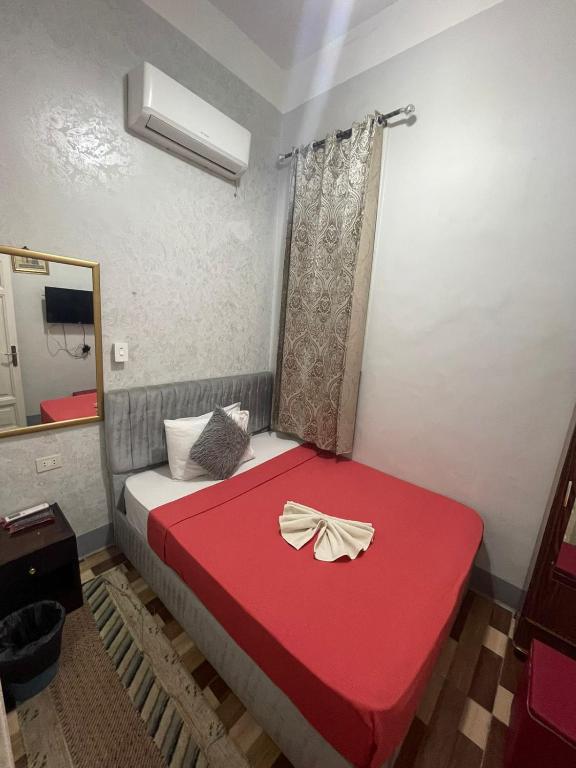 Postel nebo postele na pokoji v ubytování New One Hotel