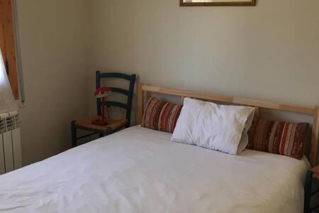 A bed or beds in a room at Apartamento Central