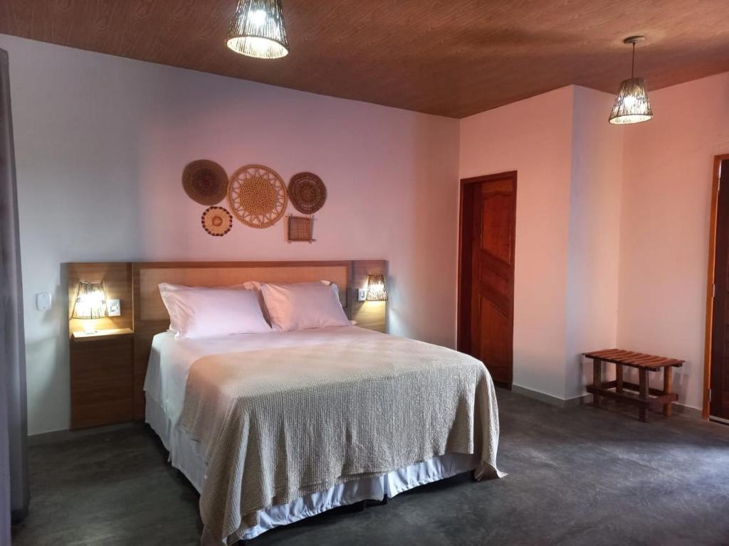 Postel nebo postele na pokoji v ubytování Pousada Lençóis Eco Villa