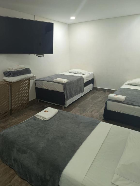 Postel nebo postele na pokoji v ubytování Hotel Prestige
