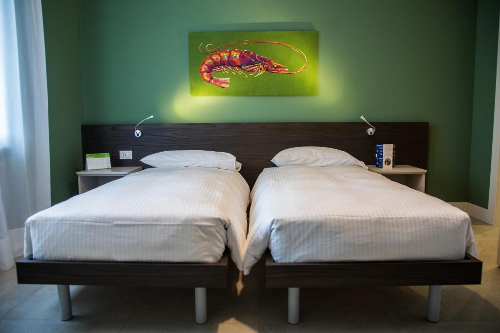 A bed or beds in a room at Casa Consani