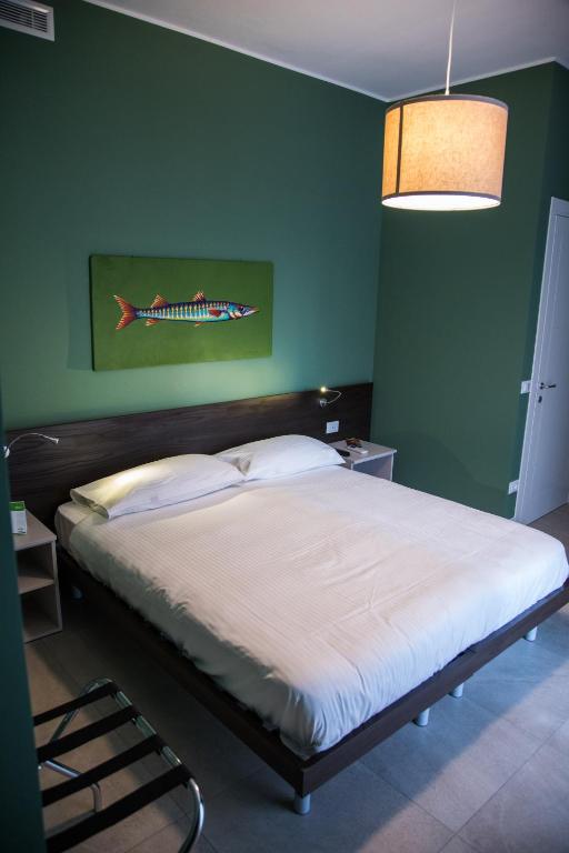 A bed or beds in a room at Casa Consani