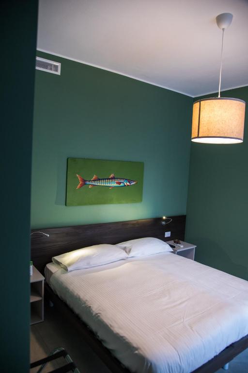 A bed or beds in a room at Casa Consani