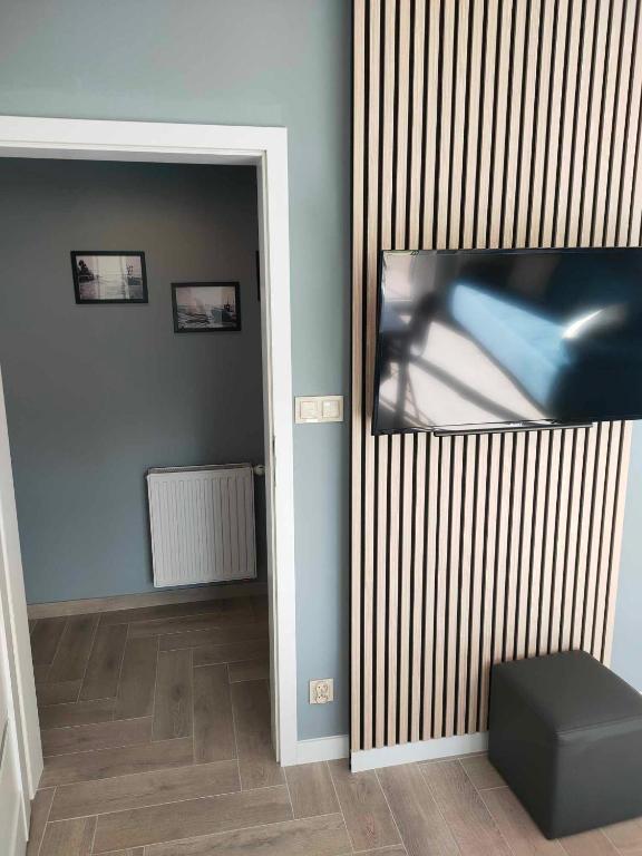 TV a/nebo společenská místnost v ubytování Zatoka pensjonat