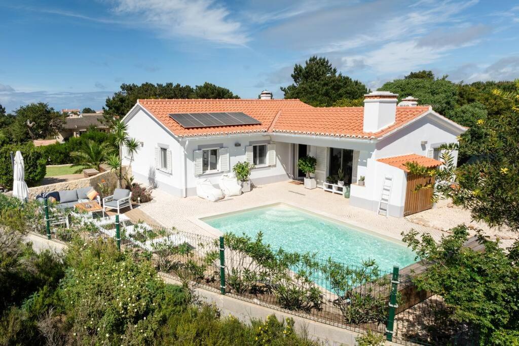 an aerial view of a house with a swimming pool at Seashore Escape in Aljezur