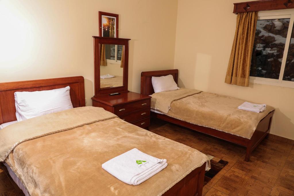 Postel nebo postele na pokoji v ubytování Samar Resort Aparthotel