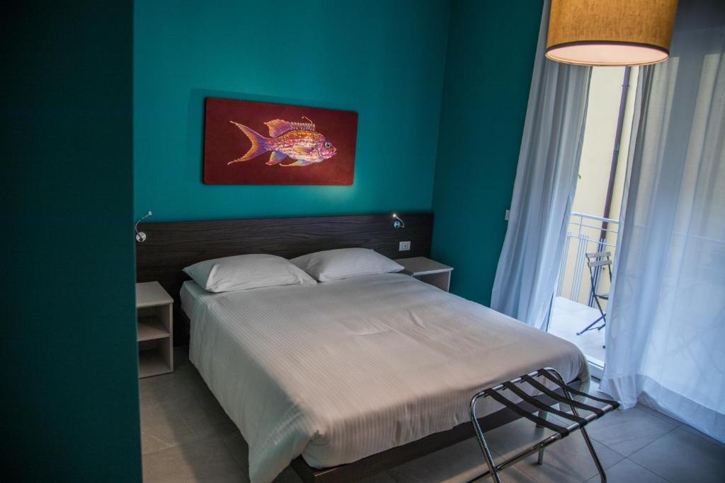 A bed or beds in a room at Casa Consani