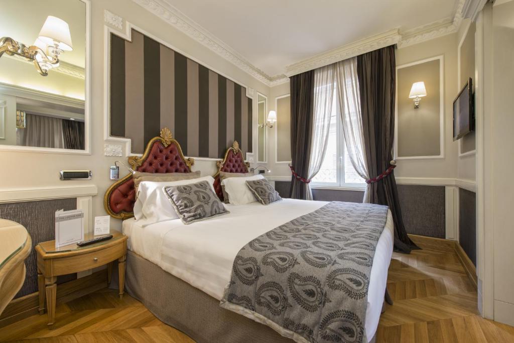 Postel nebo postele na pokoji v ubytování The Britannia Hotel
