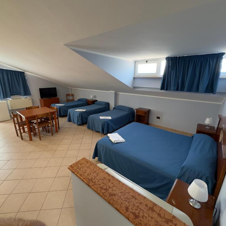 TV a/nebo společenská místnost v ubytování Hotel Immagine