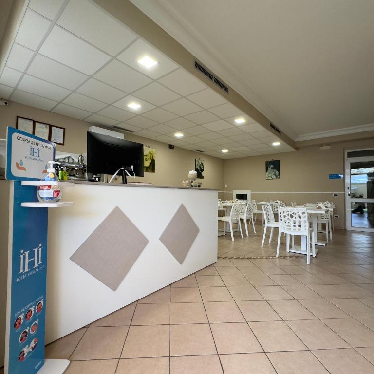 Kuchyň nebo kuchyňský kout v ubytování Hotel Immagine