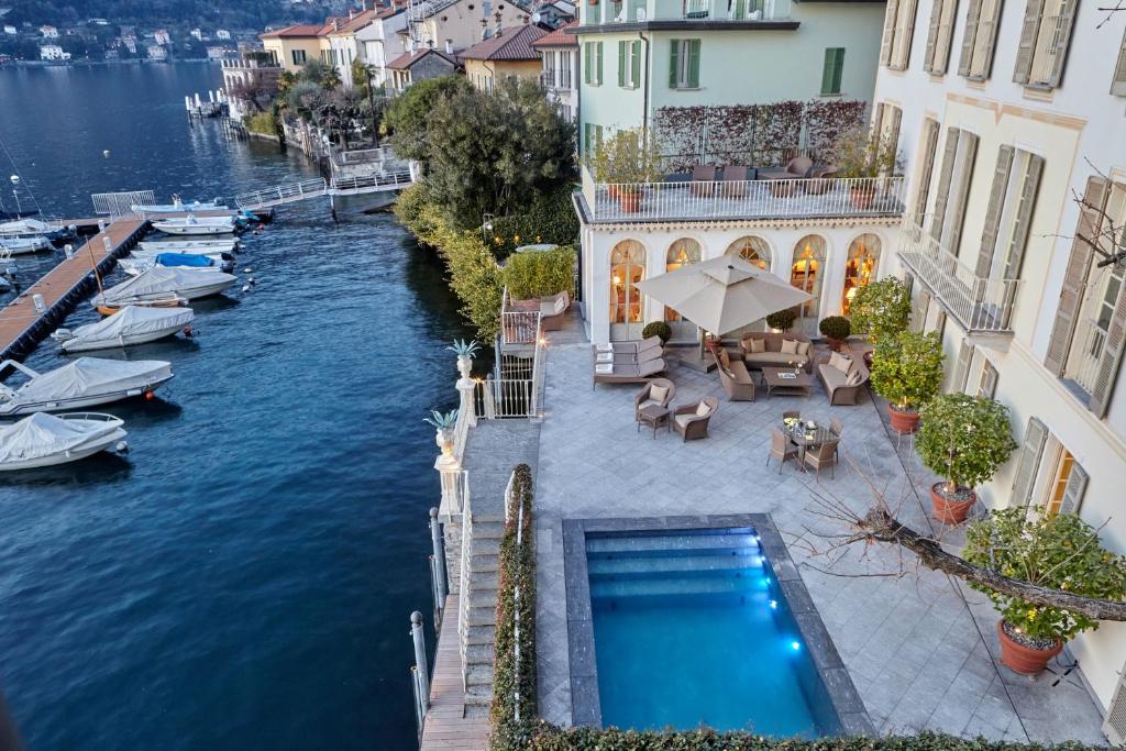 an aerial view of a house with a swimming pool at Villa Tesoro by MyVillaCollection in Torno