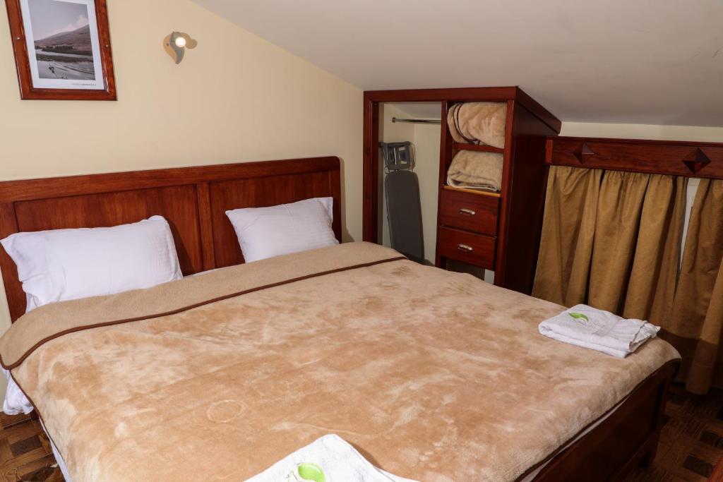 Postel nebo postele na pokoji v ubytování Samar Resort Aparthotel