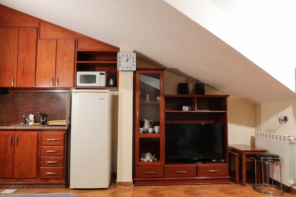 Kuchyň nebo kuchyňský kout v ubytování Samar Resort Aparthotel