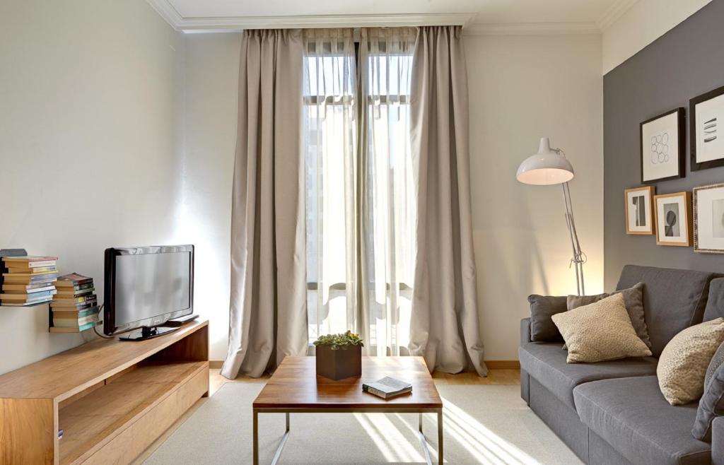 TV a/nebo společenská místnost v ubytování Apartments Sixtyfour