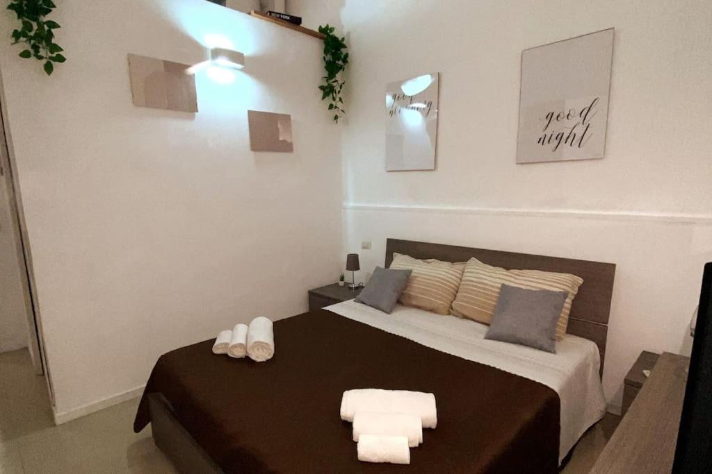 Ένα ή περισσότερα κρεβάτια σε δωμάτιο στο Mydomu House